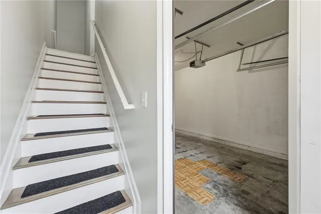 a view of a storage & utility room with a sink