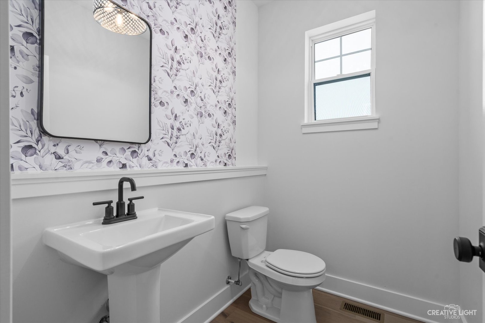 665 Ivan Drive Sycamore, IL 60178 - Photo 13 of 30 a bathroom with a sink toilet and mirror