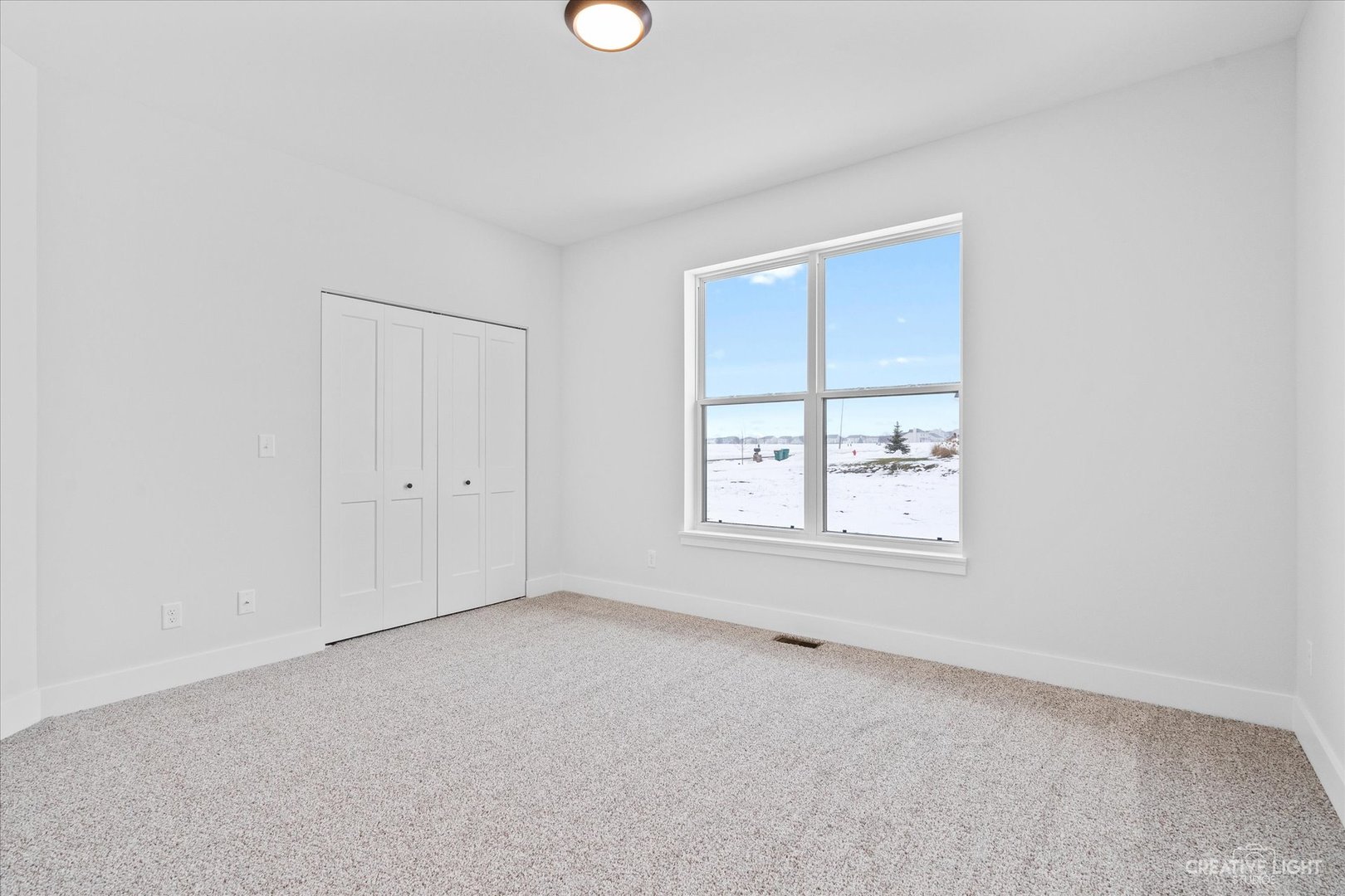 665 Ivan Drive Sycamore, IL 60178 - Photo 19 of 30 an empty room with a window