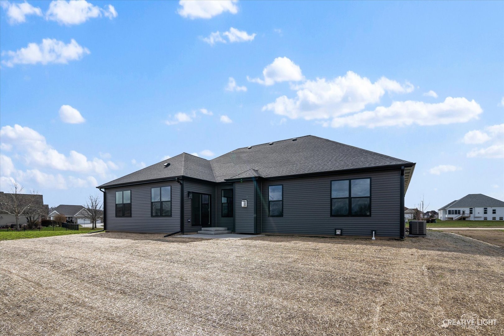 665 Ivan Drive Sycamore, IL 60178 - Photo 28 of 30 a front view of a house with a yard and garage