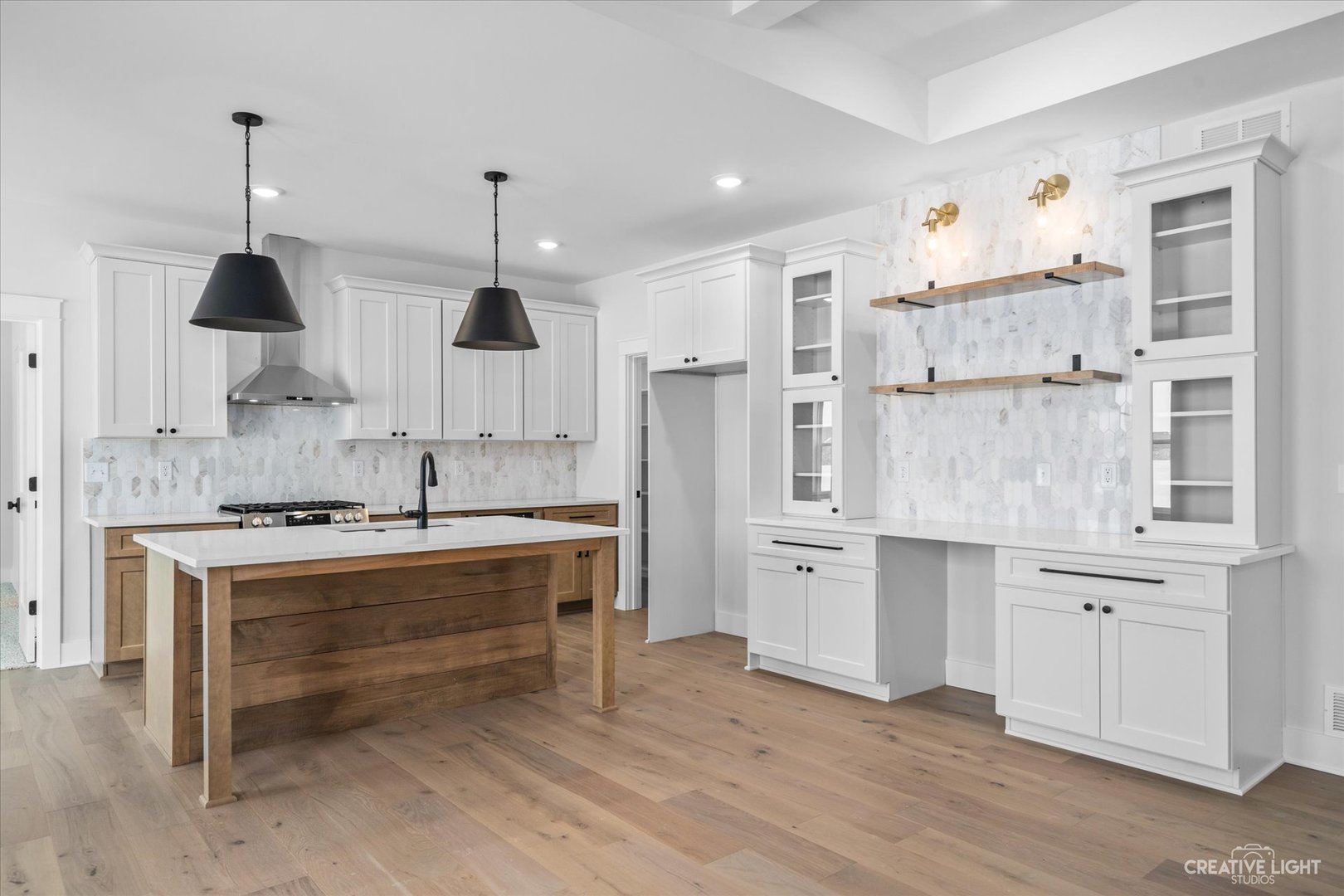665 Ivan Drive Sycamore, IL 60178 - Photo 8 of 30 a kitchen with stainless steel appliances granite countertop a sink stove and refrigerator