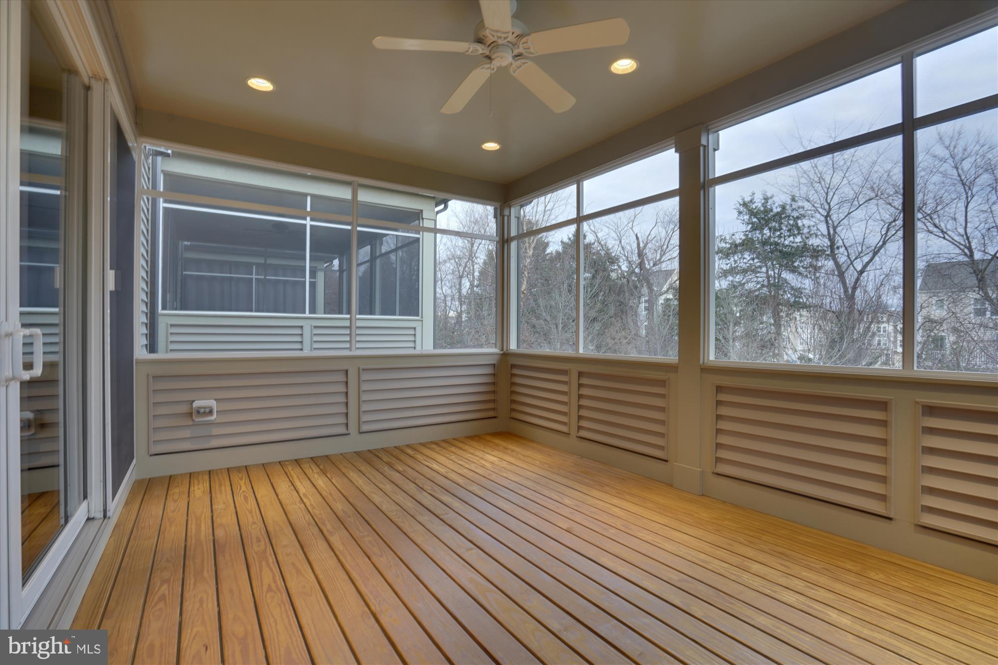 23550 Epperson Square Brambleton, VA 20148 - Photo 12 of 35 Screened porch overlooking trees