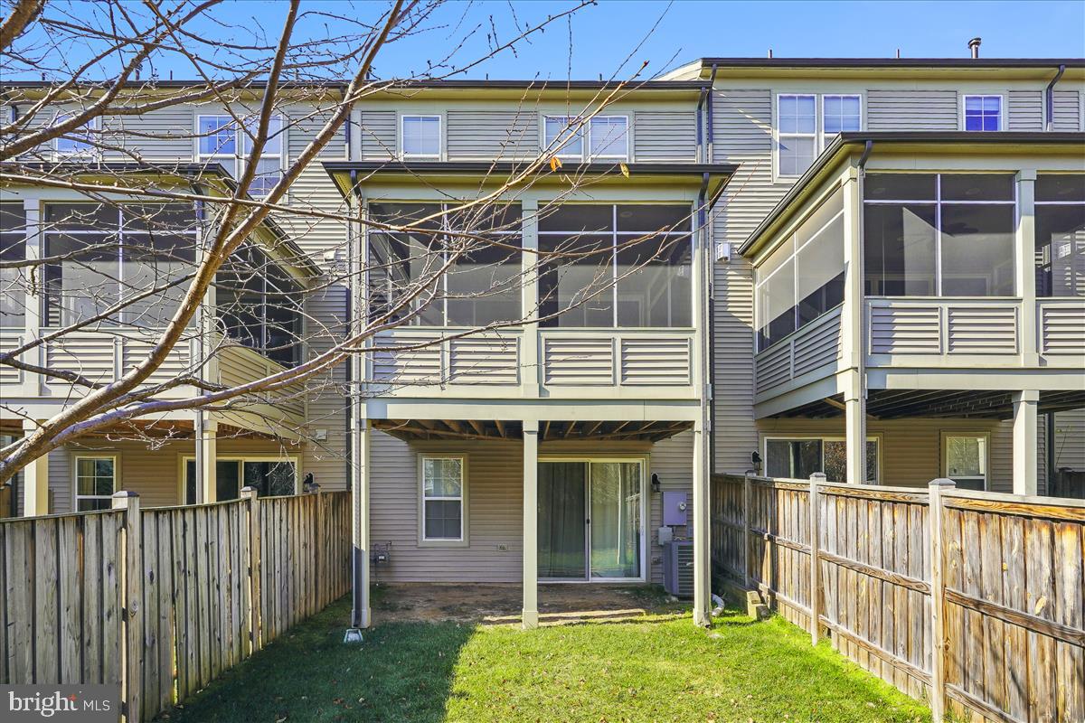 23550 Epperson Square Brambleton, VA 20148 - Photo 26 of 35 Screened porch and huge, fenced-in, private yard.
