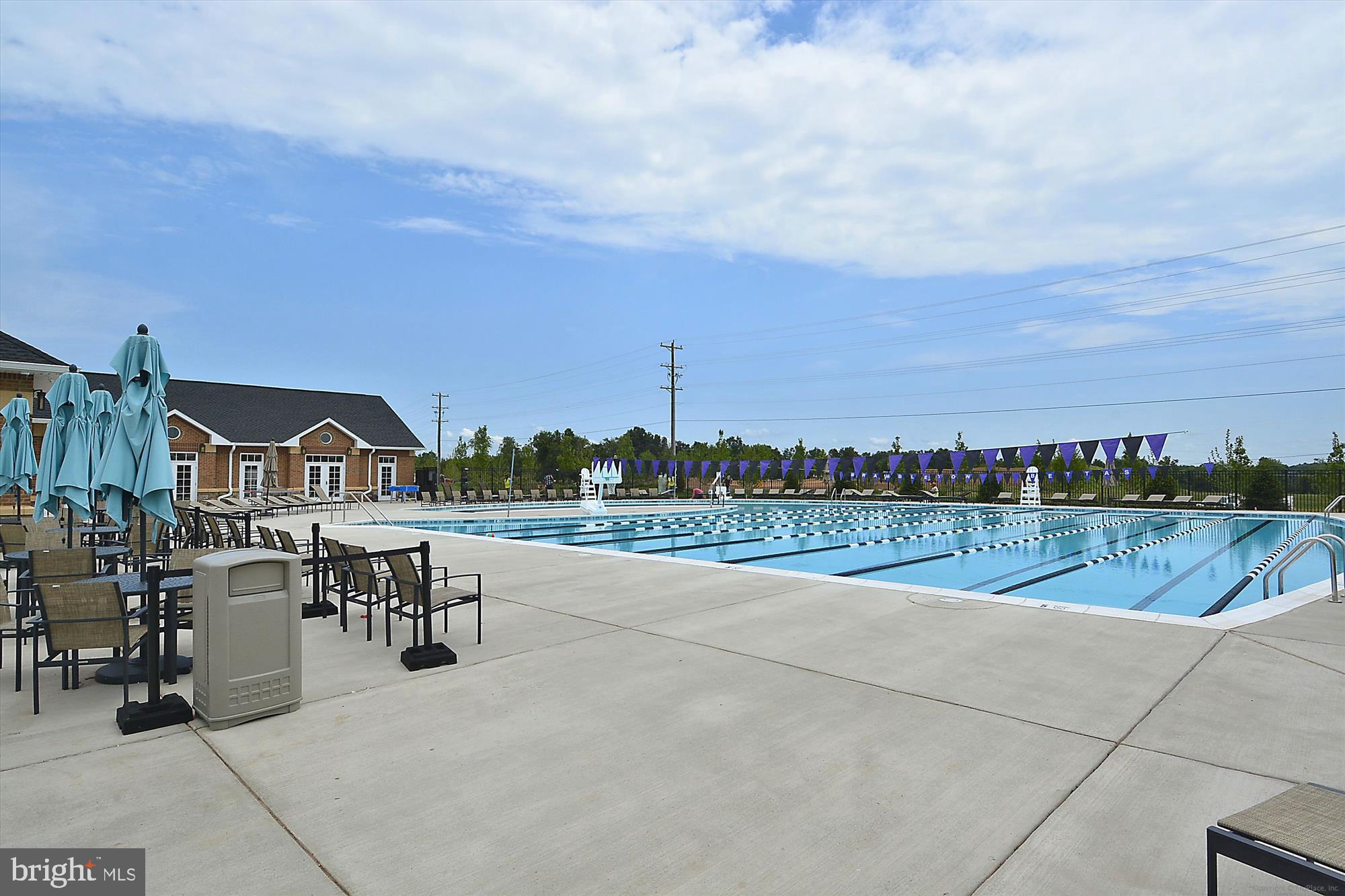 23550 Epperson Square Brambleton, VA 20148 - Photo 27 of 35 One of three outdoor pools, available to residents