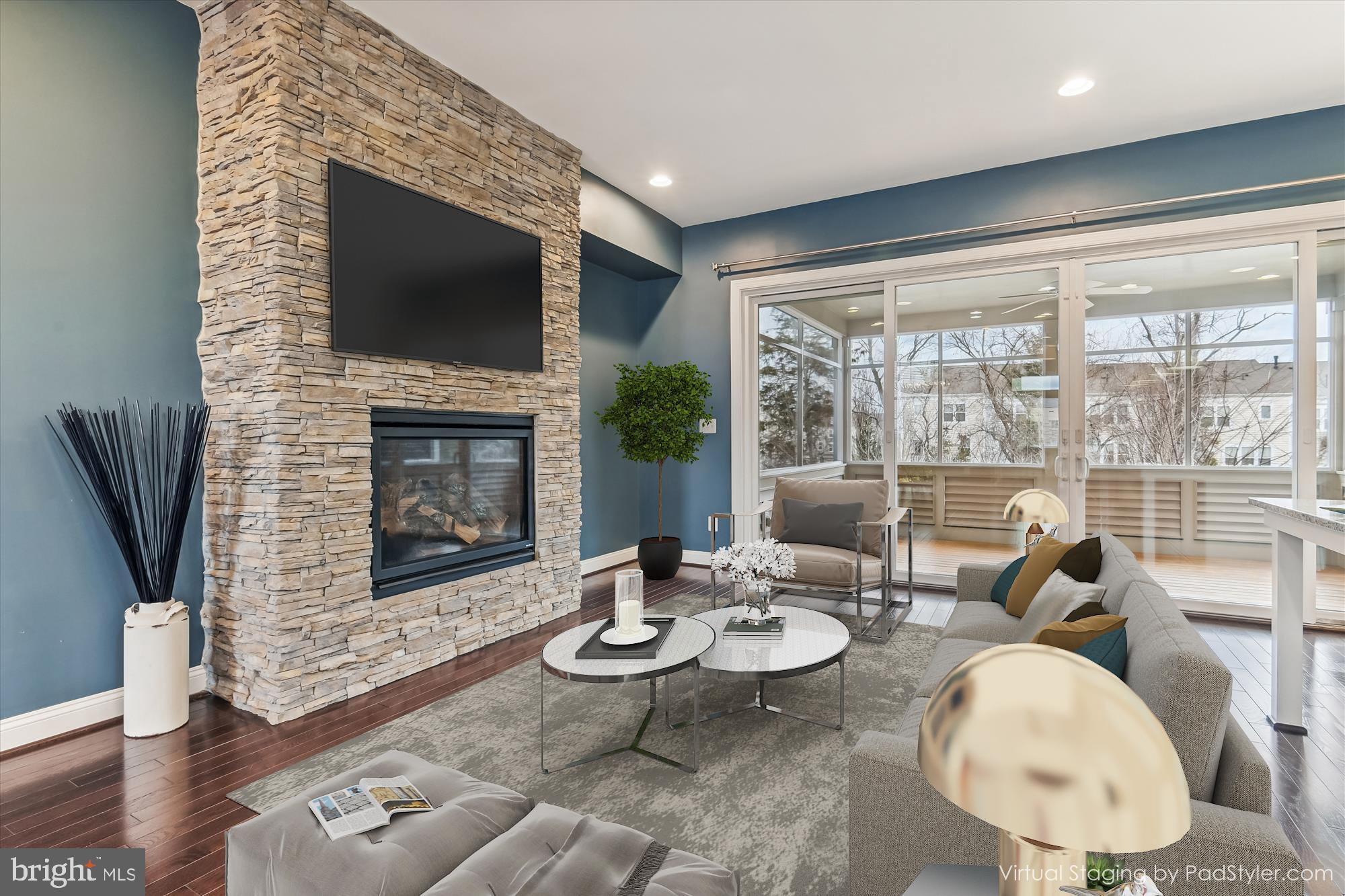 23550 Epperson Square Brambleton, VA 20148 - Photo 8 of 35 Great room with stone, gas fireplace