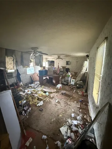 a living room with lots of furniture