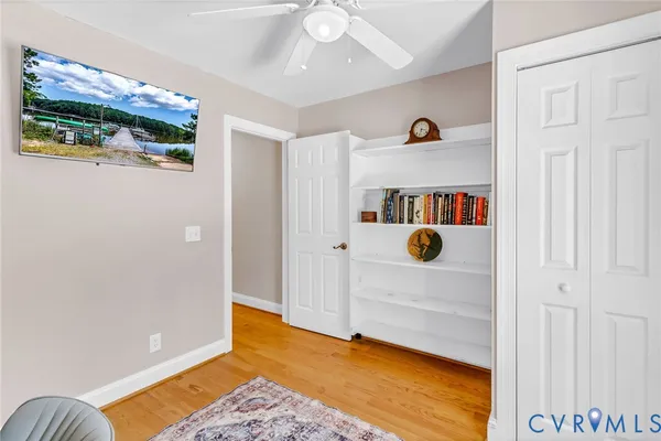 a view of an entryway with wooden floor