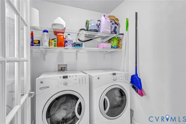a utility room with dryer and washer