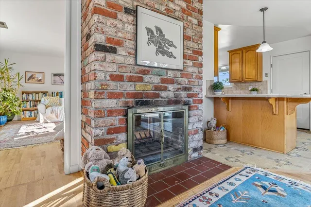 a kitchen with stainless steel appliances granite countertop a sink and a stove