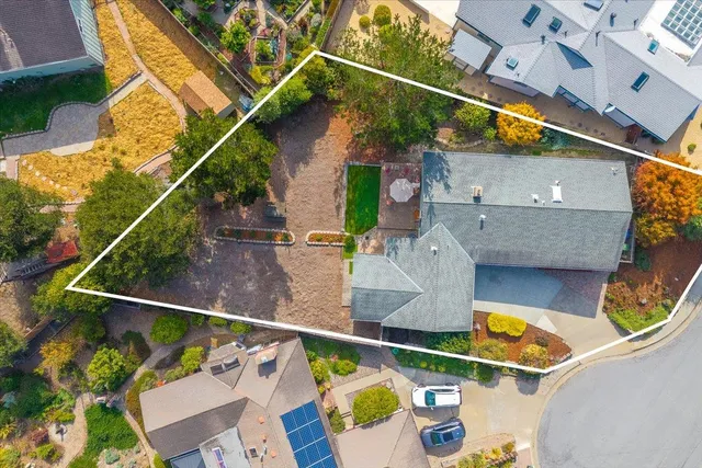 a room with water heater and white walls