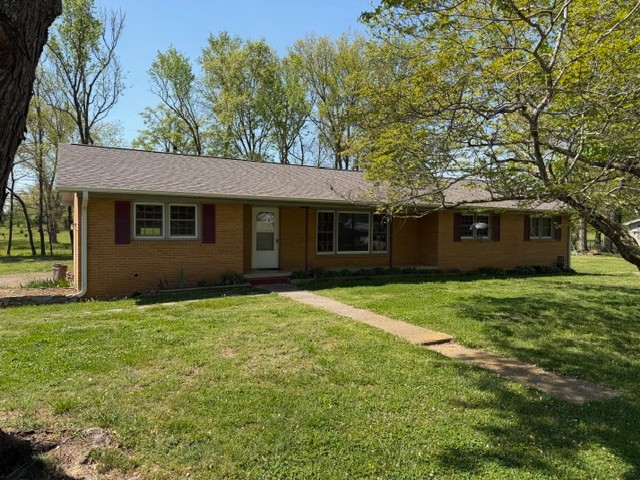 a house view with a garden space