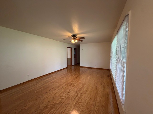 12 Perkins Road Fayetteville, TN 37334 - Photo 11 of 25 wooden floor in an empty room with a window