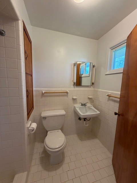 12 Perkins Road Fayetteville, TN 37334 - Photo 22 of 25 a bathroom with a toilet a sink and a mirror