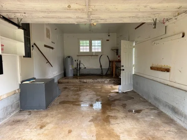 a view of livingroom with furniture and windows