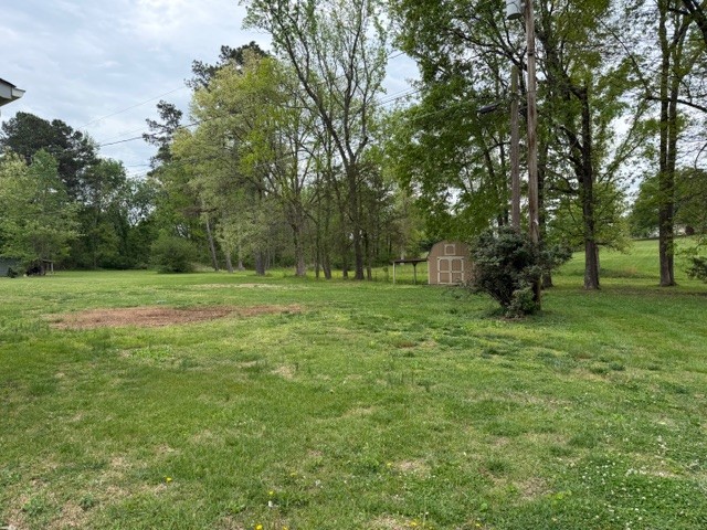 12 Perkins Road Fayetteville, TN 37334 - Photo 5 of 25 a backyard of a house with lots of green space