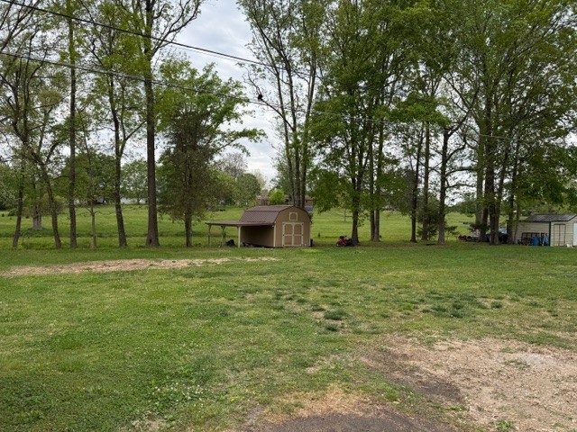 12 Perkins Road Fayetteville, TN 37334 - Photo 6 of 25 a view of outdoor space with deck and yard