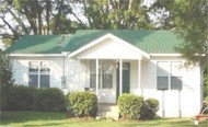 5857 Bush Road Baker, FL 32531 - Photo 1 of 1 a view of a house with backyard and garden