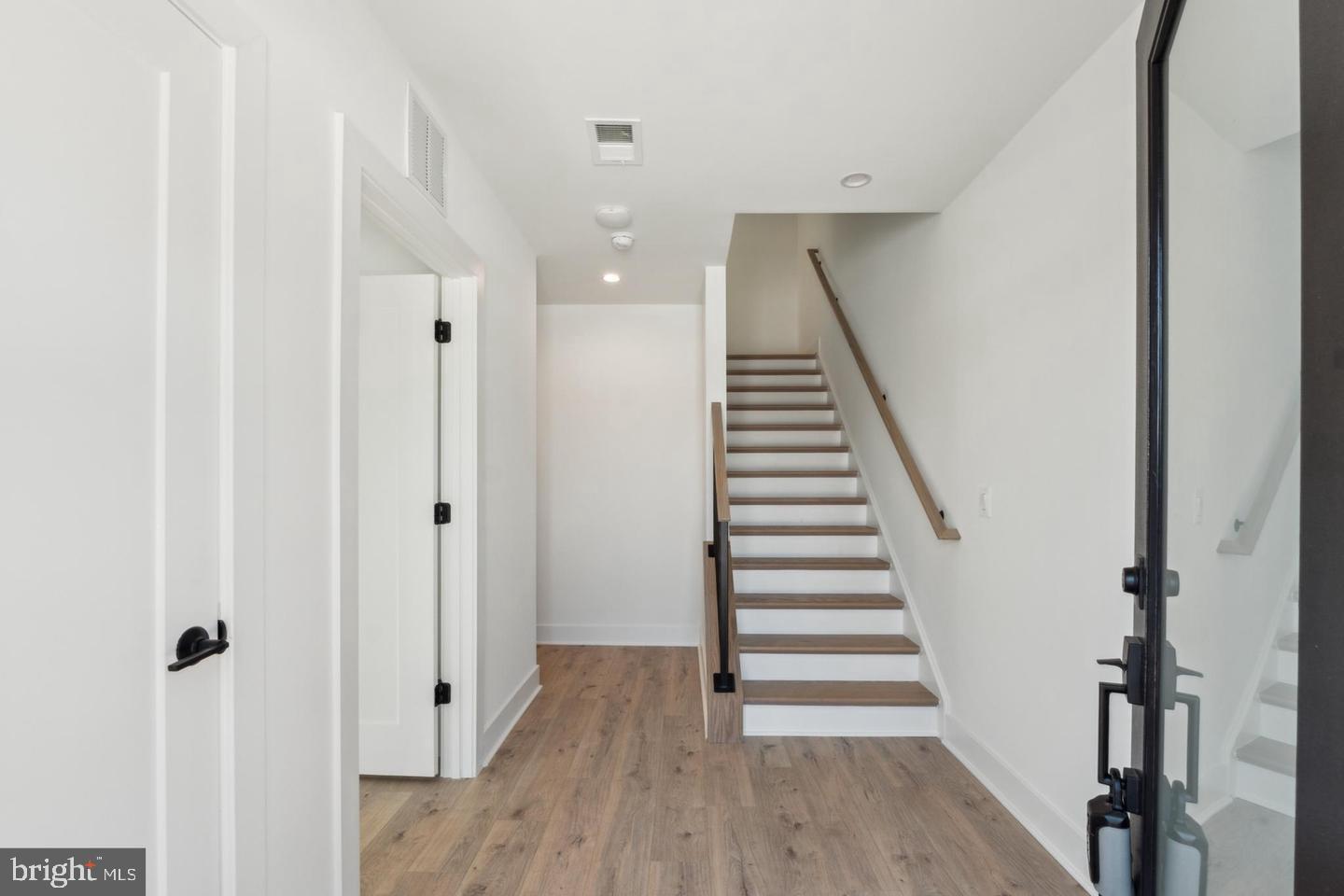 2106 Tysons Ridgeline Road Falls Church, VA 22043 - Photo 3 of 40 Bright and airy entryway with stairs.