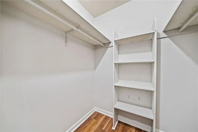 a view of an empty walk in closet