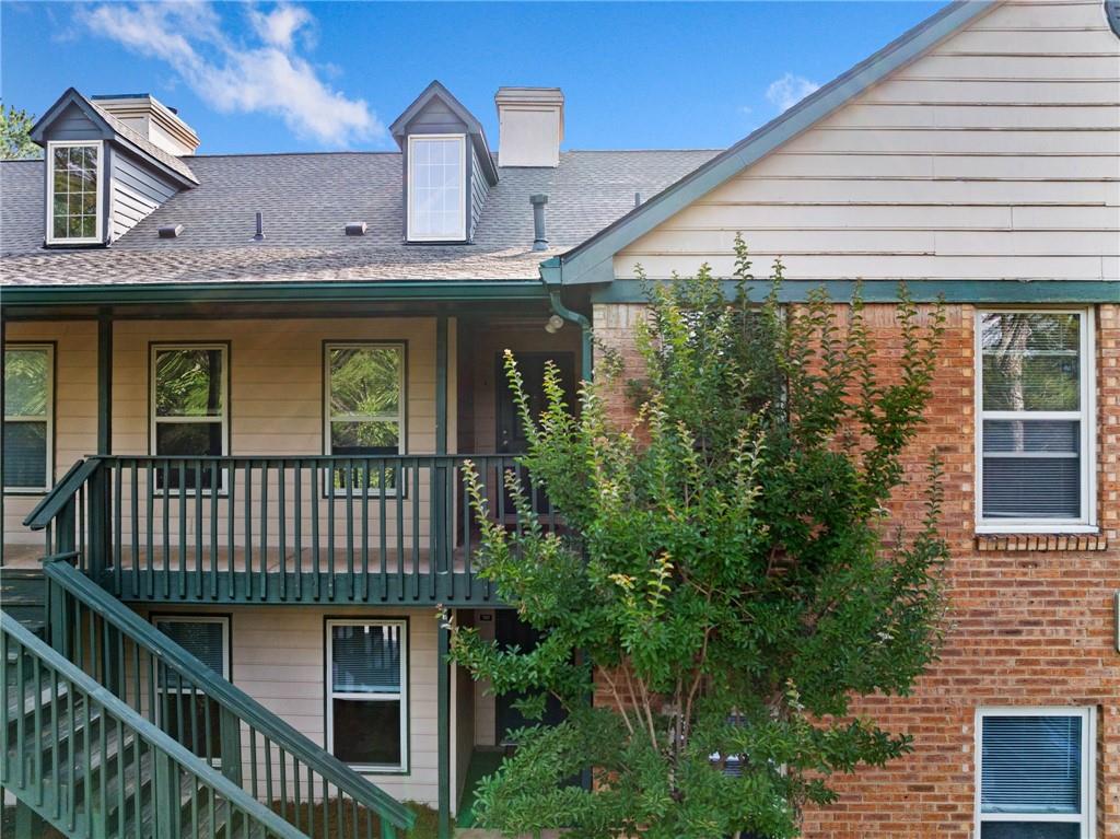 717 Beaufort Circle Duluth, GA 30096 - Photo 27 of 42 a front view of a house with balcony