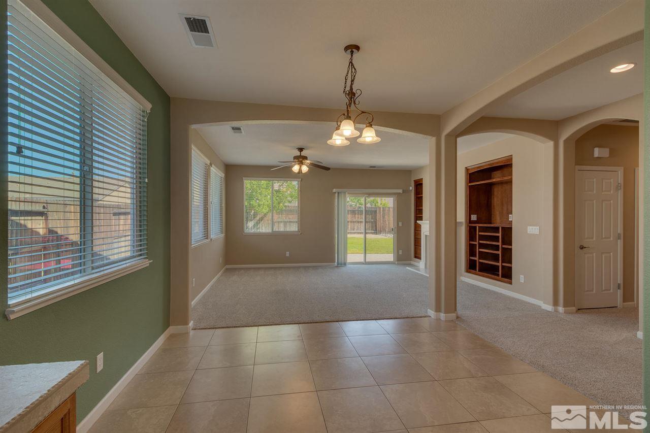 1721 Camaraderie Way Reno, NV 89521 - Photo 11 of 18 a view of an empty room with a window