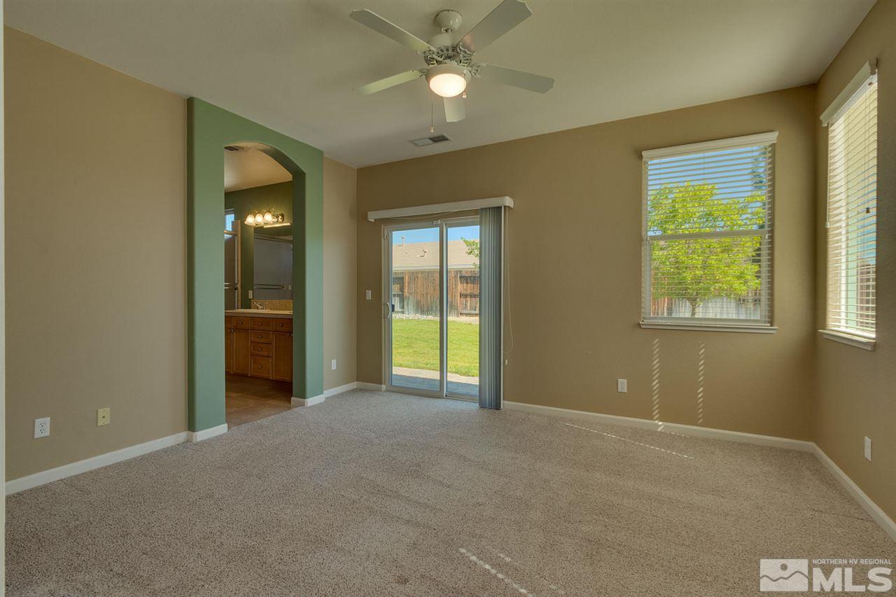 1721 Camaraderie Way Reno, NV 89521 - Photo 13 of 18 a view of an empty room with a window