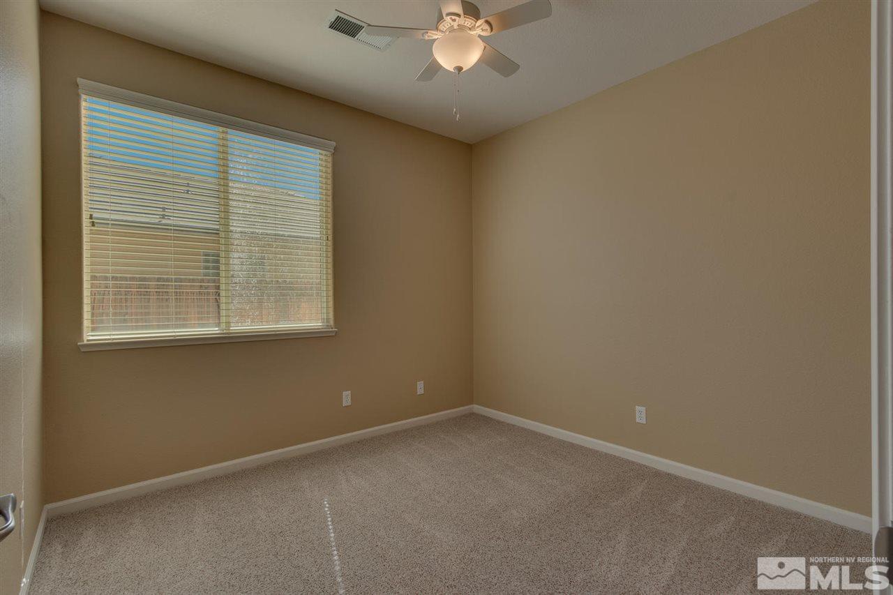 1721 Camaraderie Way Reno, NV 89521 - Photo 16 of 18 an empty room with a window