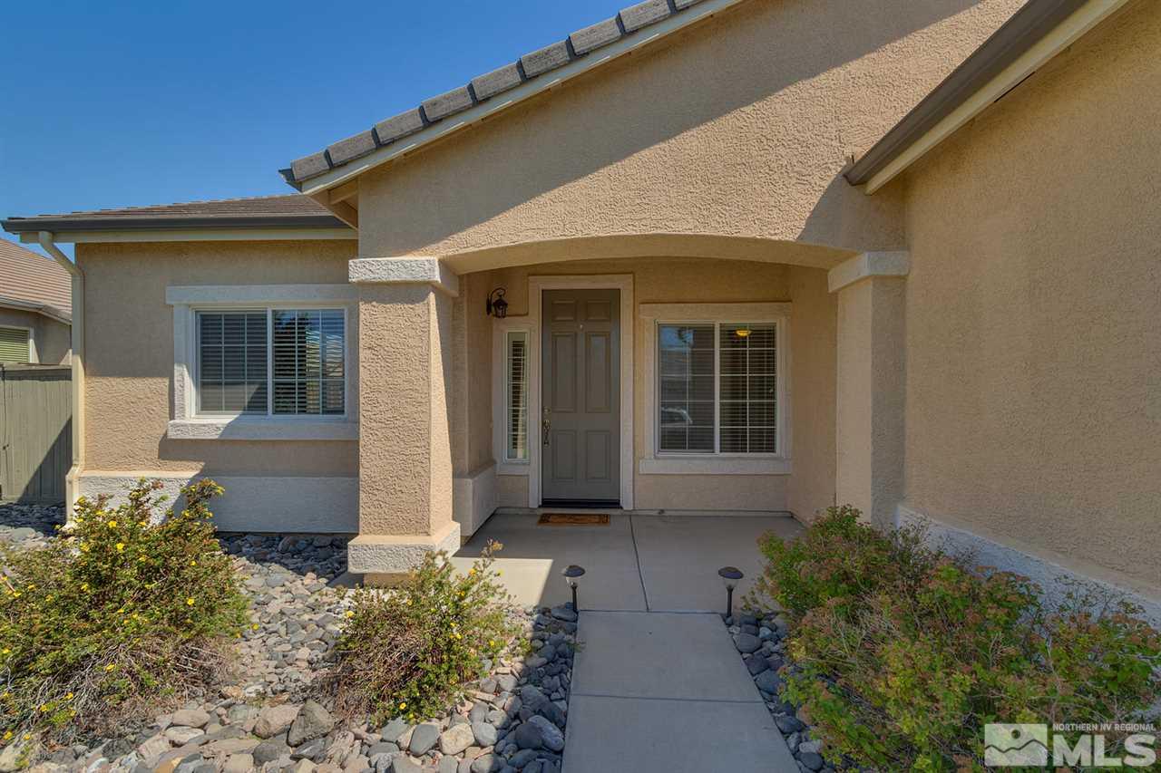 1721 Camaraderie Way Reno, NV 89521 - Photo 2 of 18 front view of a house