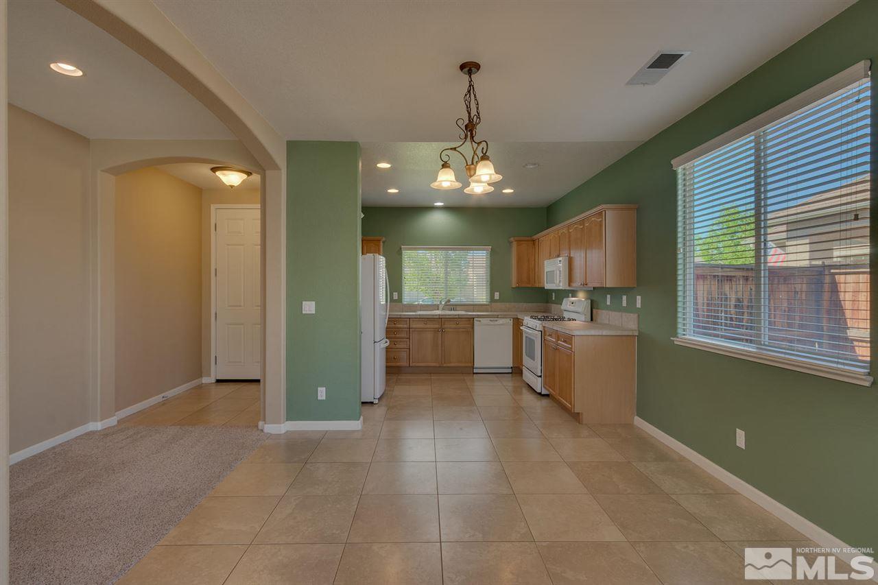 1721 Camaraderie Way Reno, NV 89521 - Photo 10 of 18 a view of a kitchen with a sink and cabinets