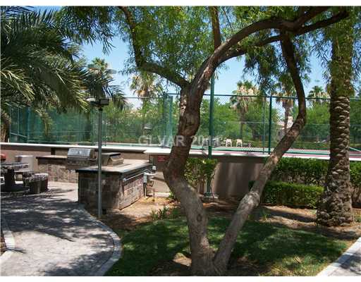 2050 West Warm Springs Road, Unit 111 Henderson, NV 89014 - Photo 4 of 23 Tennis Court. Tennis Court and BBQ Area