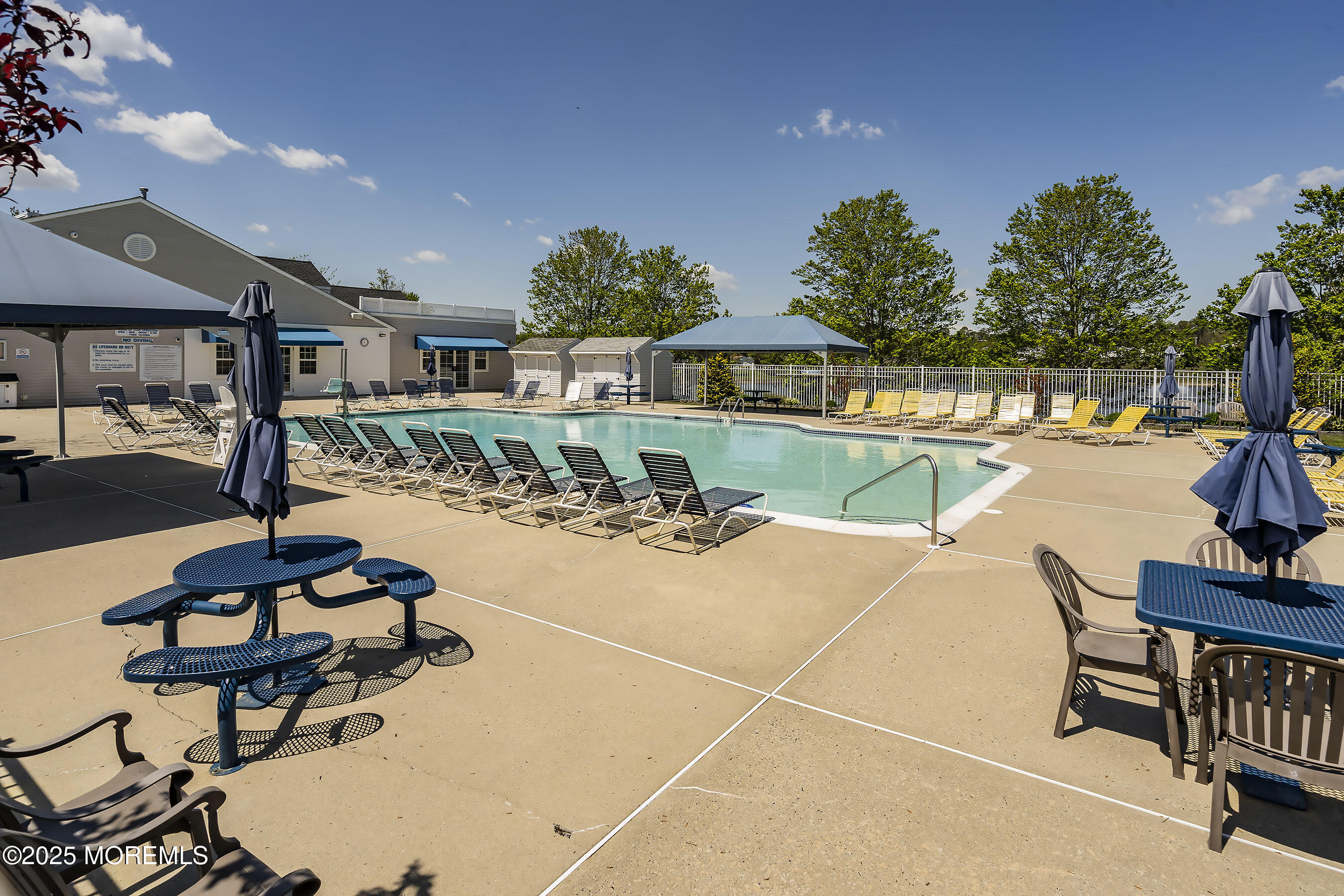 75 Perrys Lane Manahawkin, NJ 08050 - Photo 15 of 18 a view of a swimming pool and lounge chairs