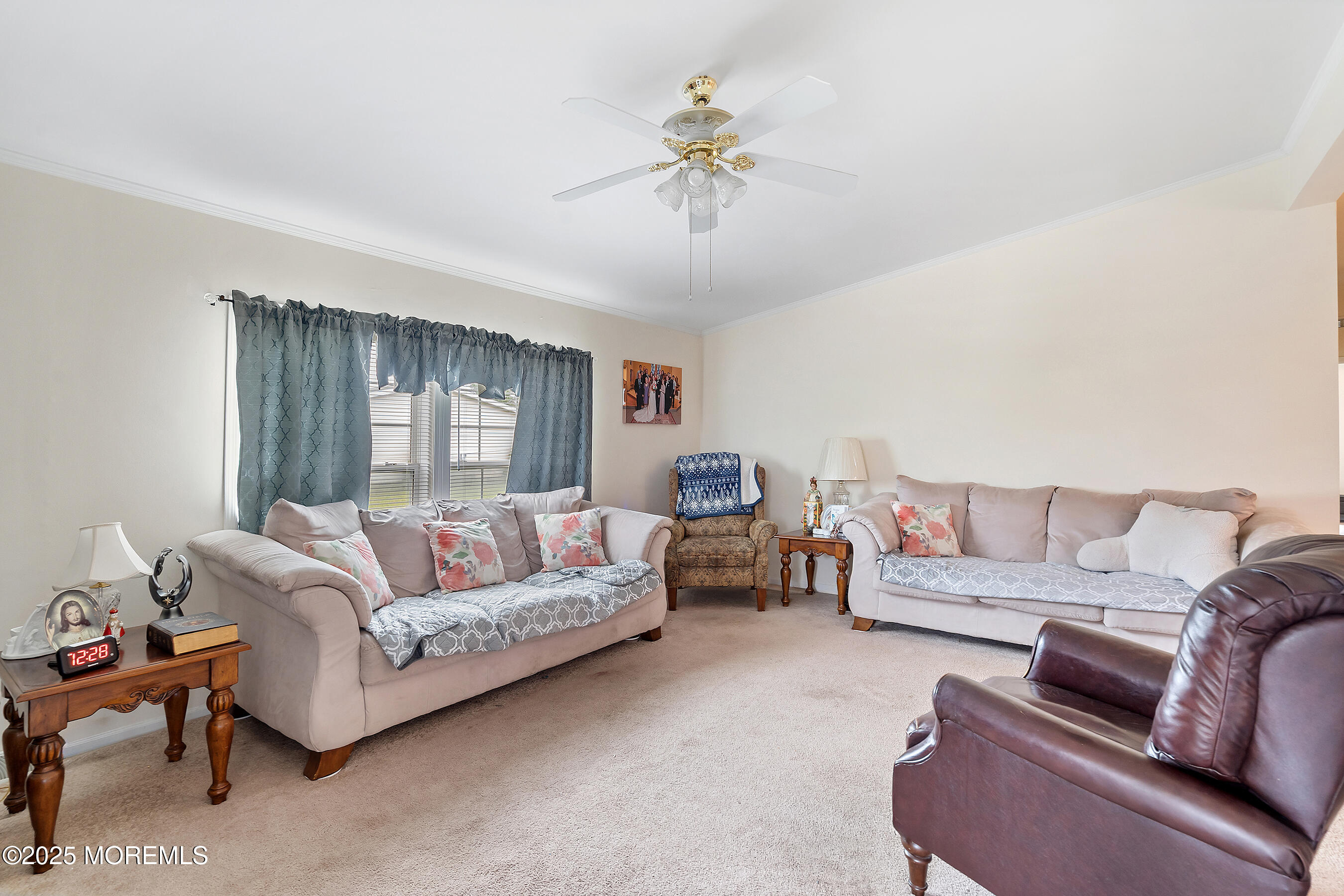 75 Perrys Lane Manahawkin, NJ 08050 - Photo 4 of 18 a living room with furniture and a large window