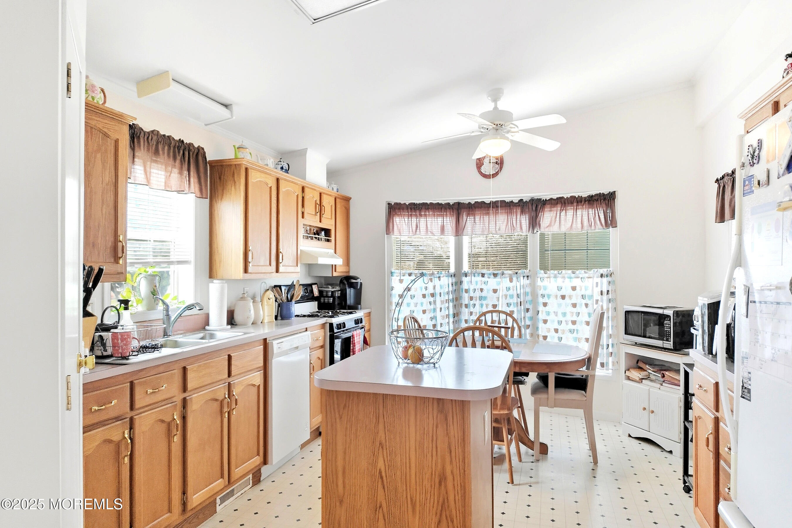 75 Perrys Lane Manahawkin, NJ 08050 - Photo 5 of 18 a view of a kitchen and dining room