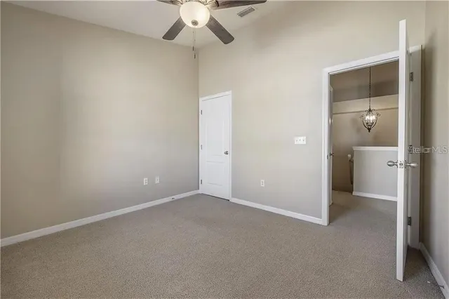 an empty room with a bathroom