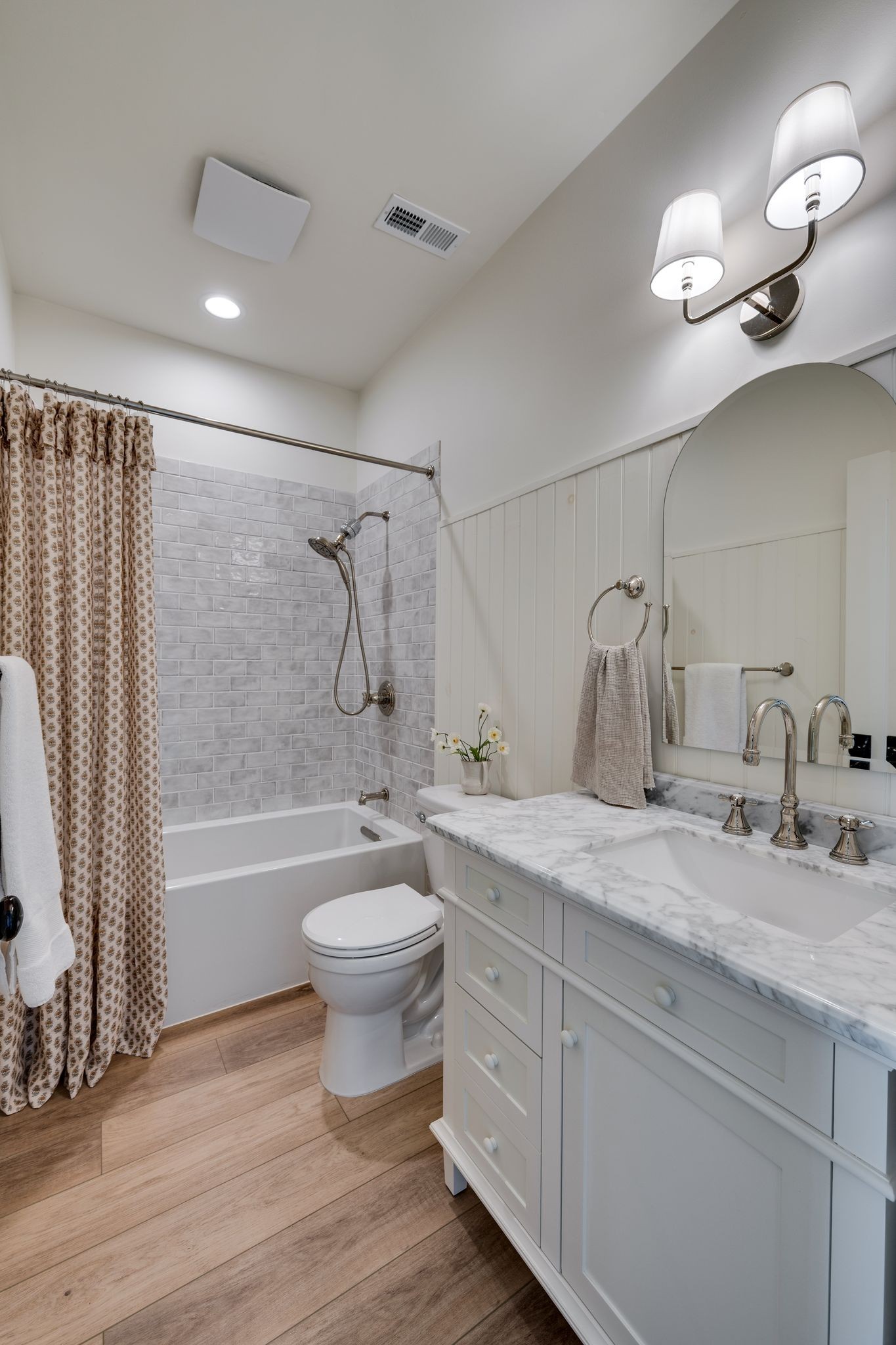 3205 Vera Valley Road Franklin, TN 37064 - Photo 30 of 52 a bathroom with a double vanity sink toilet mirror and bathtub