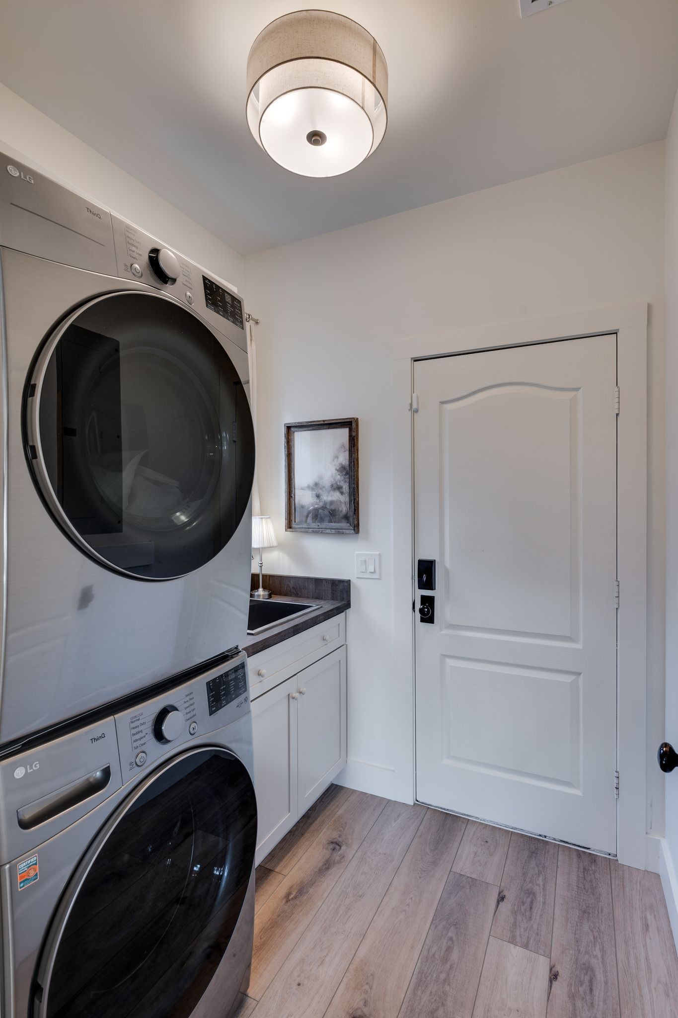 3205 Vera Valley Road Franklin, TN 37064 - Photo 31 of 52 a view of a storage and utility room with washer and dryer