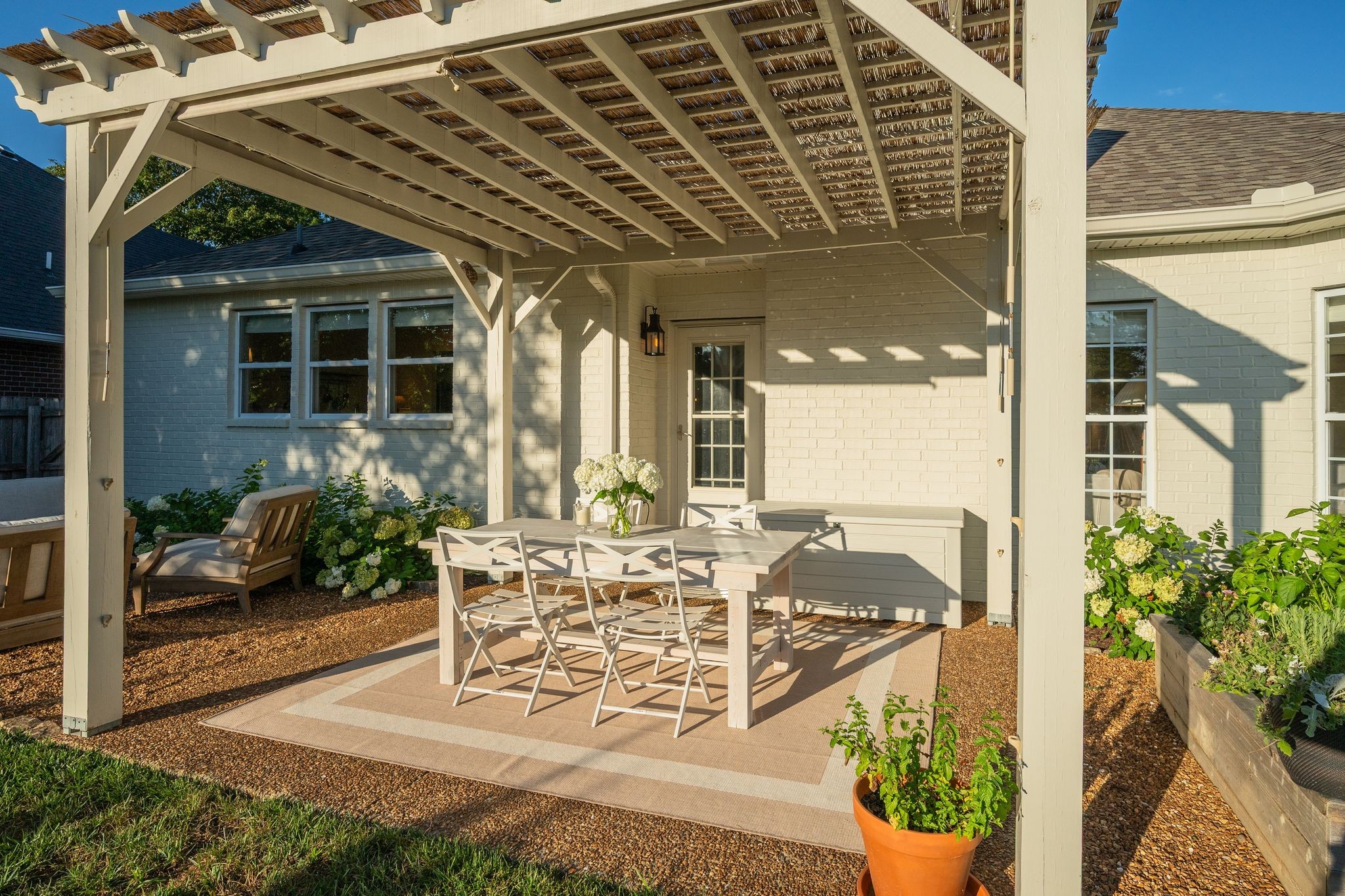 3205 Vera Valley Road Franklin, TN 37064 - Photo 34 of 52 a view of a patio with table and chairs potted plants