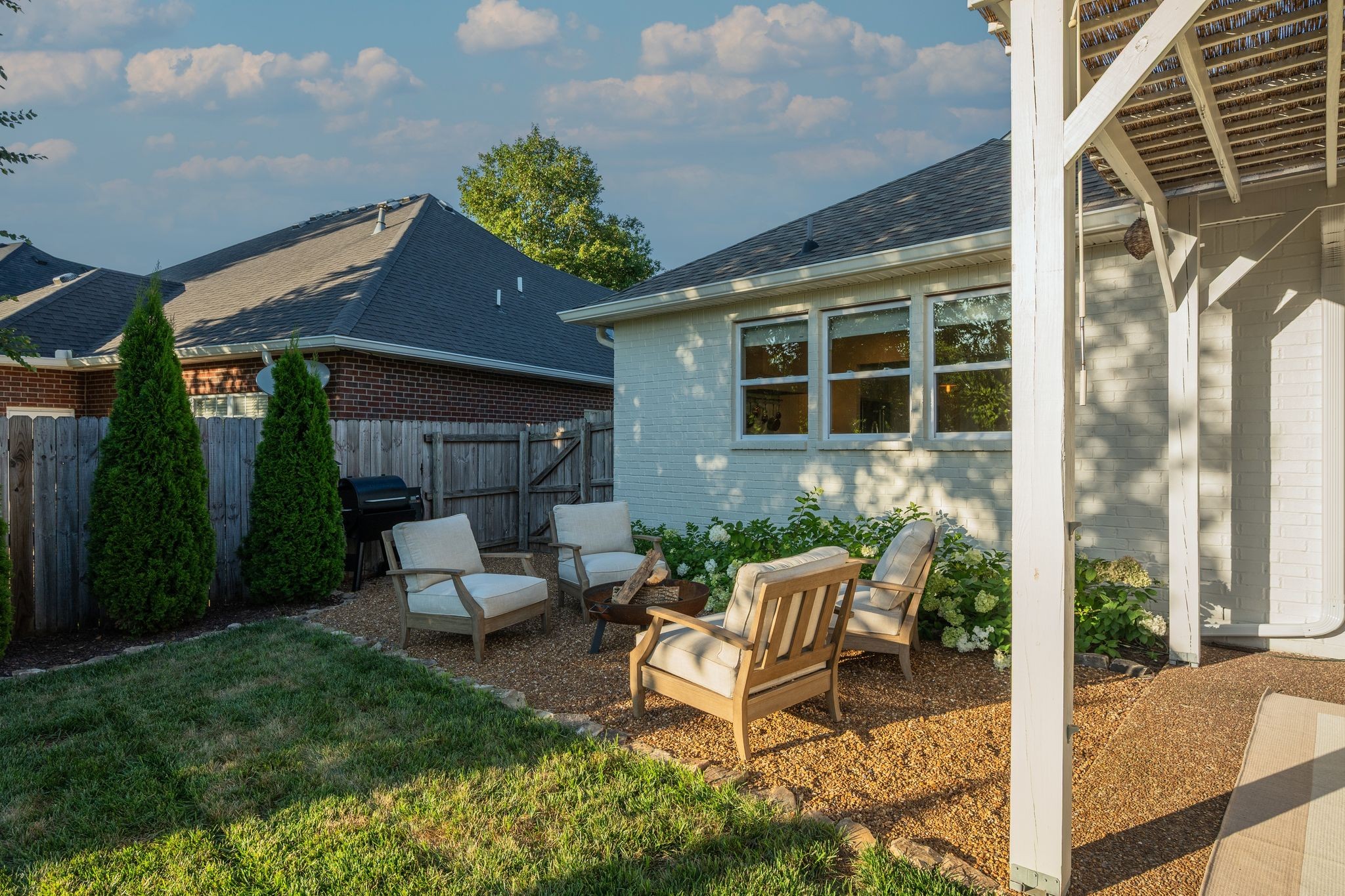 3205 Vera Valley Road Franklin, TN 37064 - Photo 36 of 52 a view of a house with backyard sitting area and garden