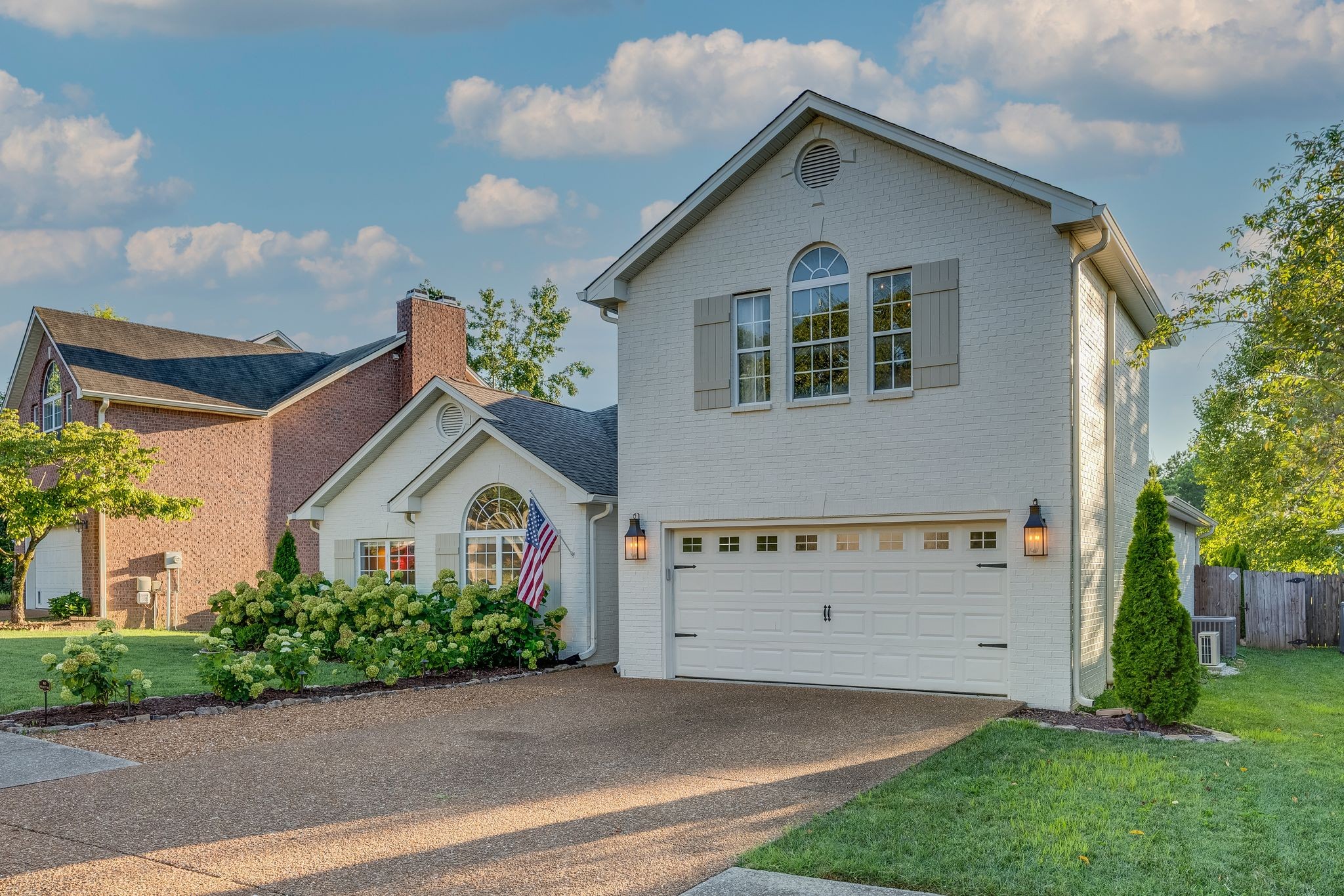3205 Vera Valley Road Franklin, TN 37064 - Photo 45 of 52 front view of house with a yard and potted plants