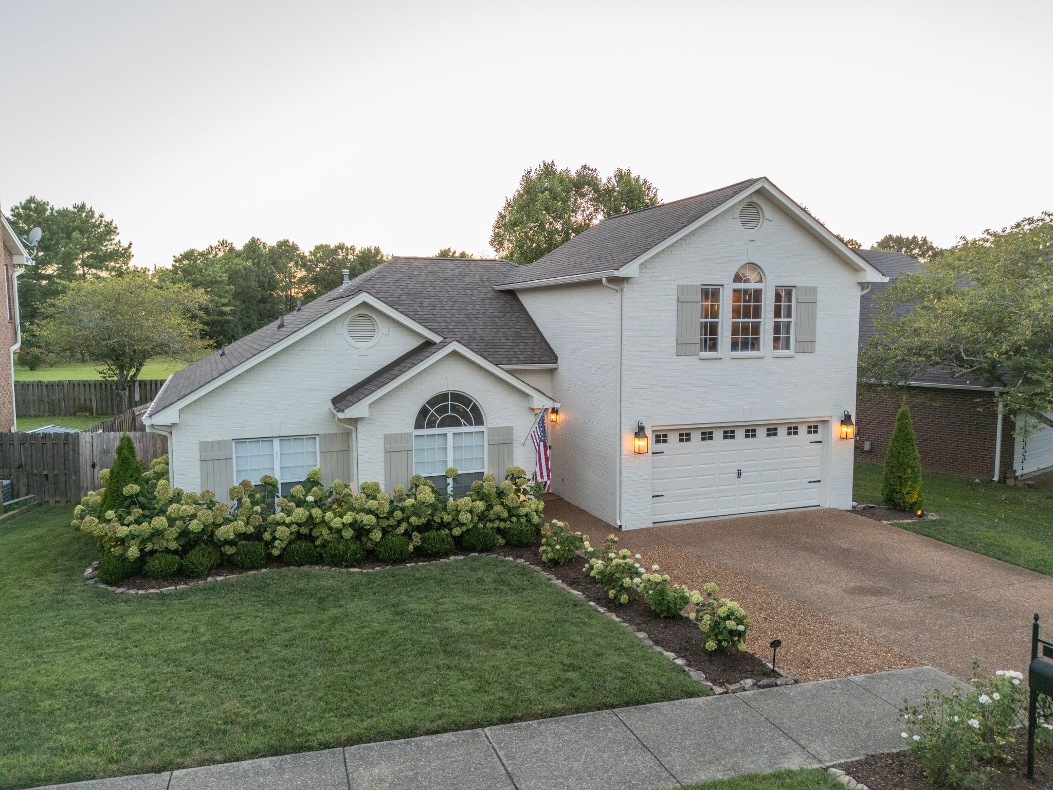 3205 Vera Valley Road Franklin, TN 37064 - Photo 46 of 52 a view of a house with a yard and plants