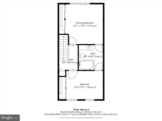 a picture of a bench in front of a wall