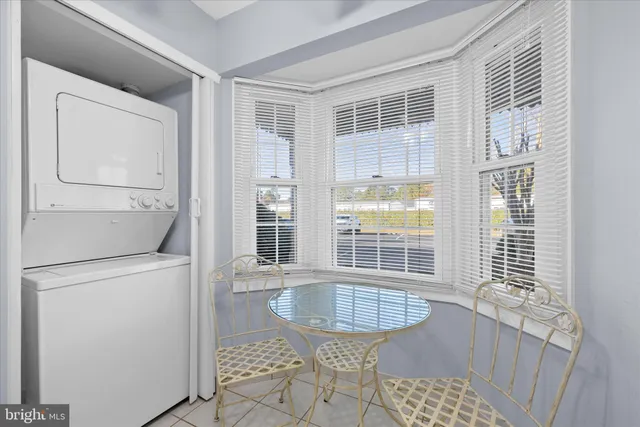 a view of a hallway with windows