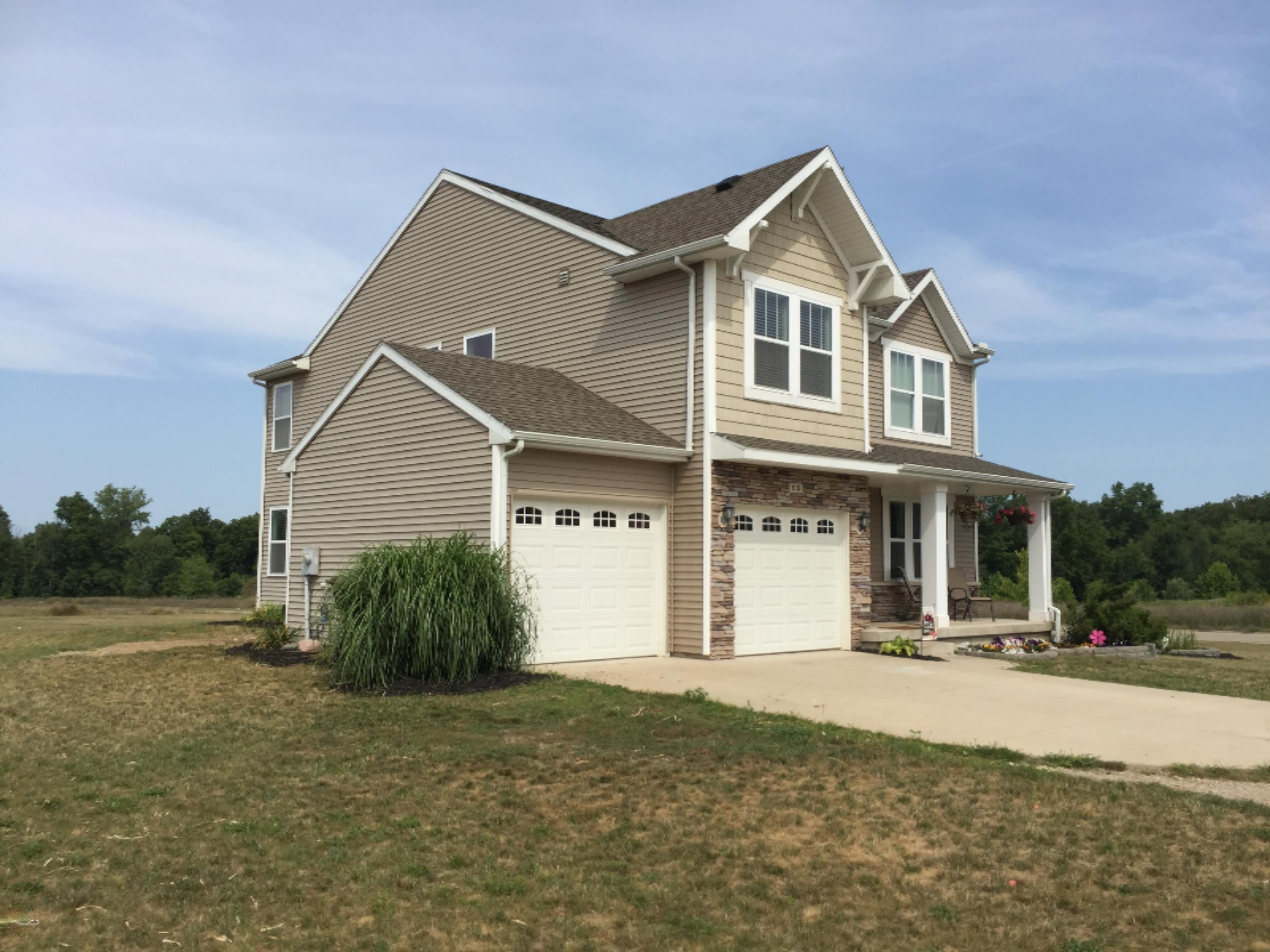 8730 Meadowrue Road Portland, MI 48875 - Photo 3 of 48 Side View