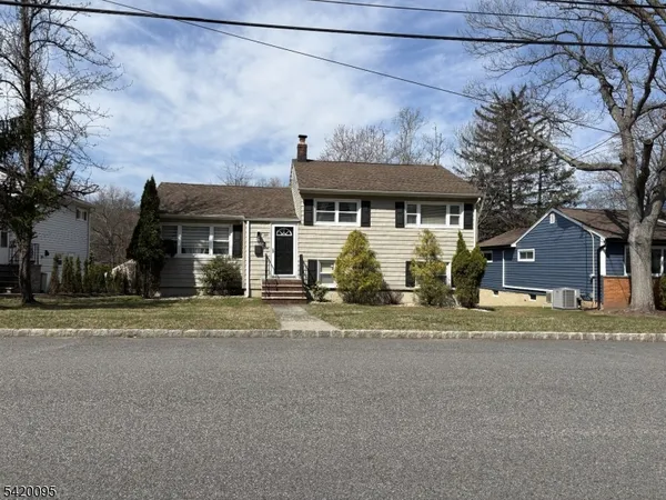 front view of a house with a street