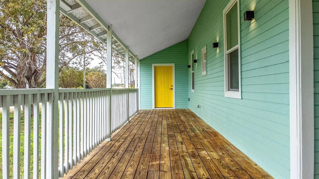 4955 Old Lucerne Park Road Winter Haven, FL 33881 - Photo 14 of 17 a view of a brick house with a large window