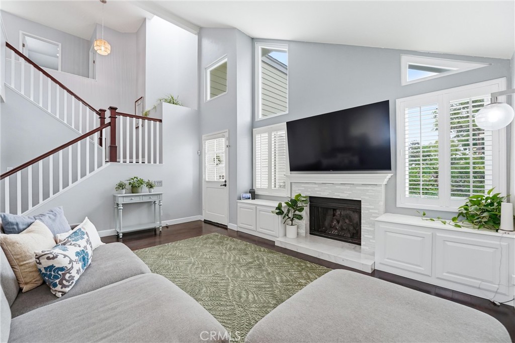 11 Shadowleaf Irvine, CA 92614 - Photo 1 of 23 Custom built in cabinetry and updated hearth surround and mantle