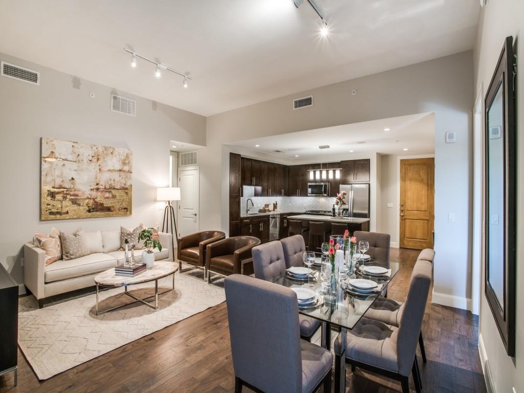 4719 Cole Avenue, Unit 358 Dallas, TX 75205 - Photo 8 of 35 a living room with furniture and a chandelier