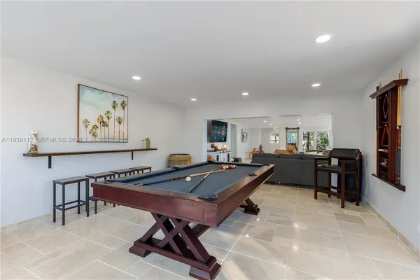 a bedroom with bed and window