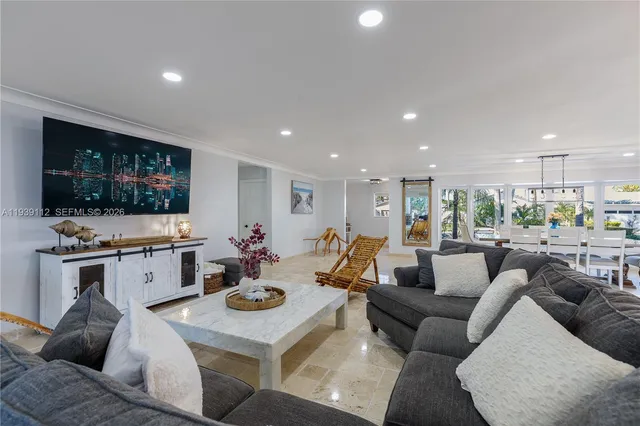 a bathroom with a double vanity sink toilet and mirror