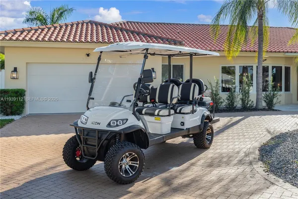 an aerial view of residential house with outdoor space and swimming pool